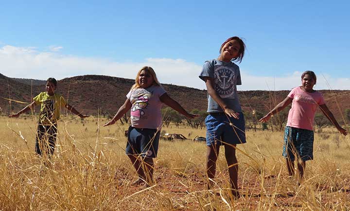 children in a field