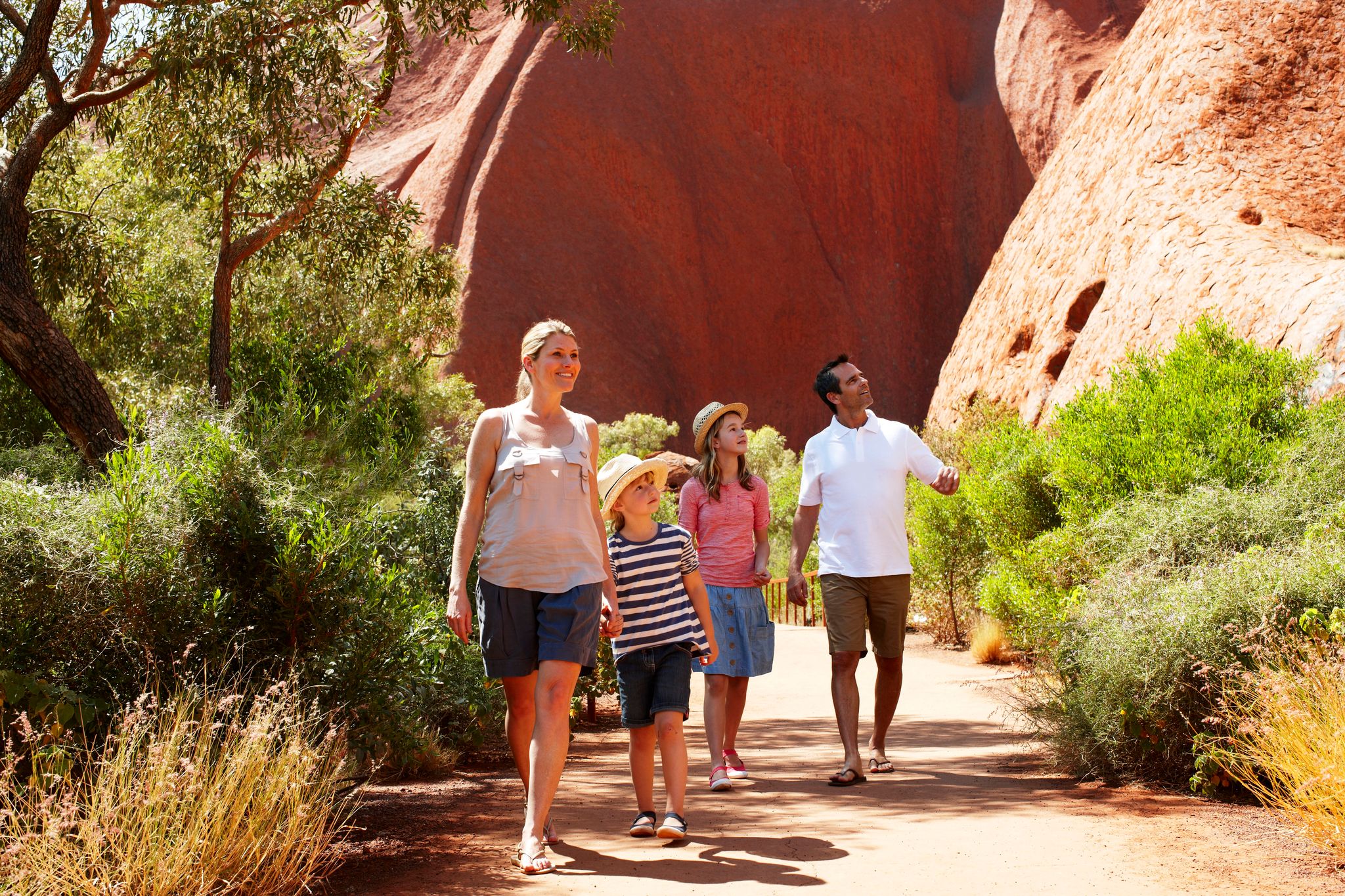 Family on base walk at uluru