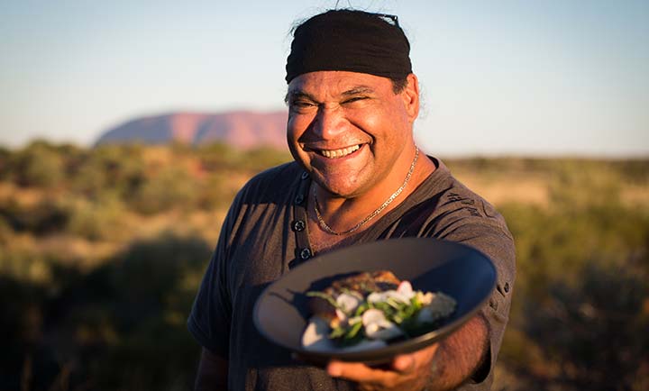 A man with bush tucker