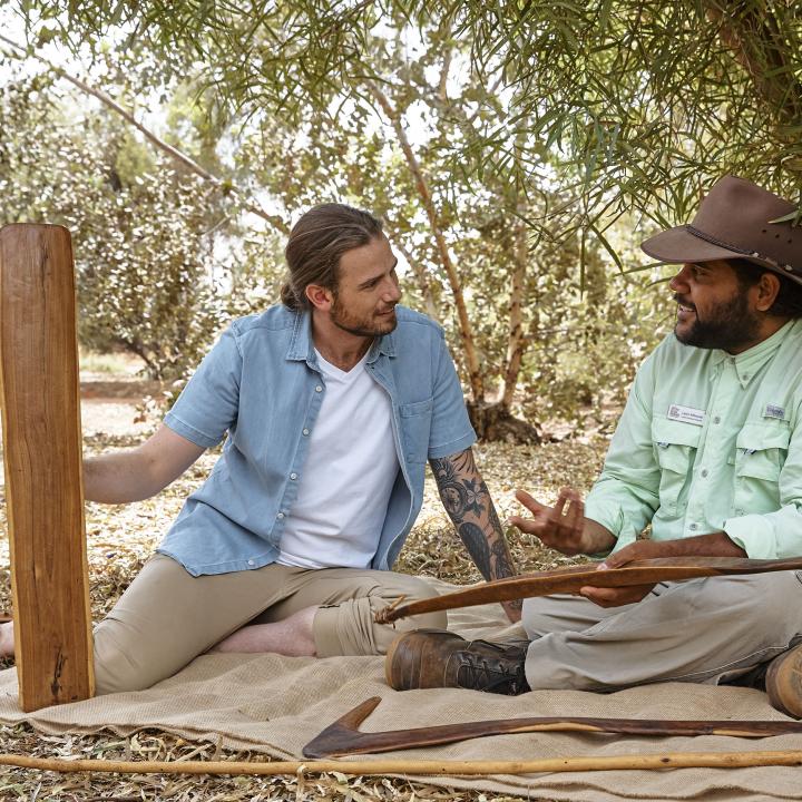 two men talking together