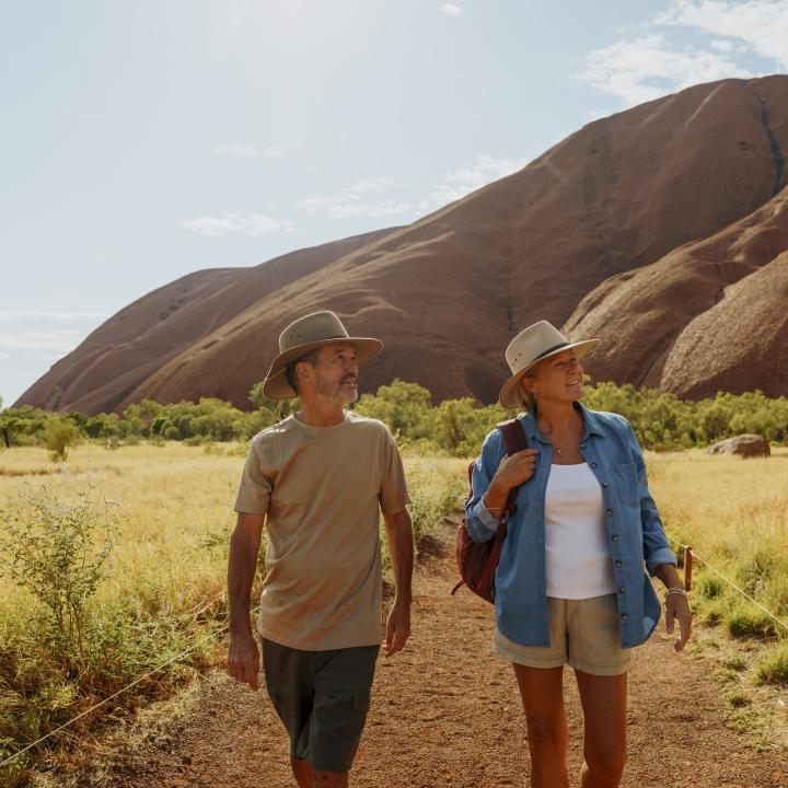 A couple on a morning walk near Uluru