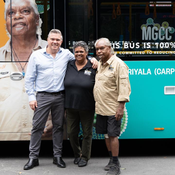 Matt Cameron-Smith - CEO of Voyages Indigenous Tourism Australia, Rachael Hodges - Manager of Mossman Gorge Cultural Centre and Roy Gibson -  Kuku Yalanji Elder, standing in front of Mossman Gorge Brand New Electric Vehicles