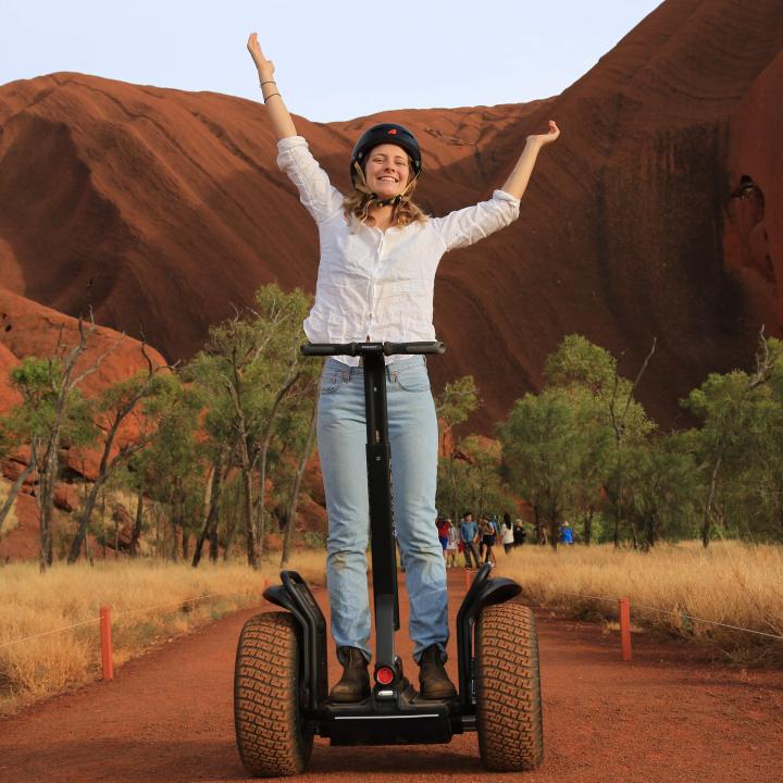 Guest on a guided Segway tour at the base of Uluru