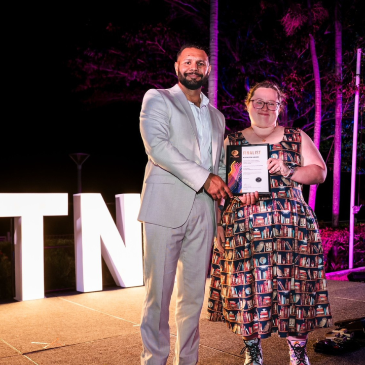 Kit Hawes receiving her award with Anthony Lew-Fatt from Cultural Journeys