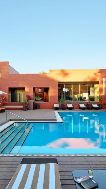 An outdoor pool at The Lost Camel | Uluru Australia | Uluru Rockies | Mossmangor Indigenous Tourism