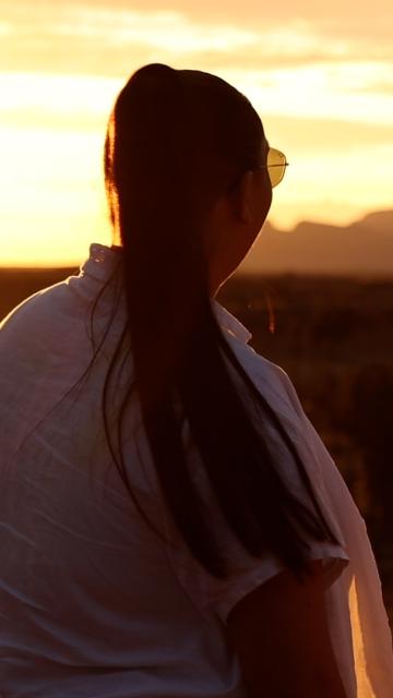 Two women looking out into the sunset